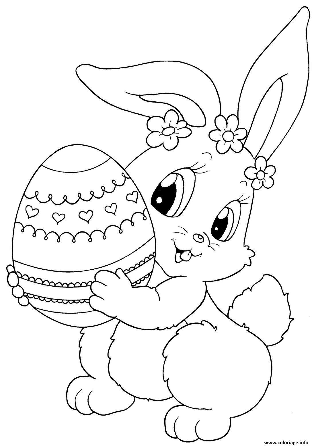 Coloriage lapin de paques avec un oeuf - JeColorie.com