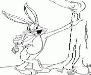 Bugs Bunny mange une carotter contre un arbre dessin à colorier
