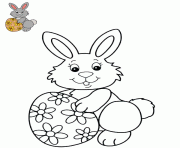 lapine avec un oeuf paques decore de fleurs dessin à colorier