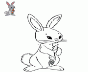 Coloriage un lapin mange une carotte