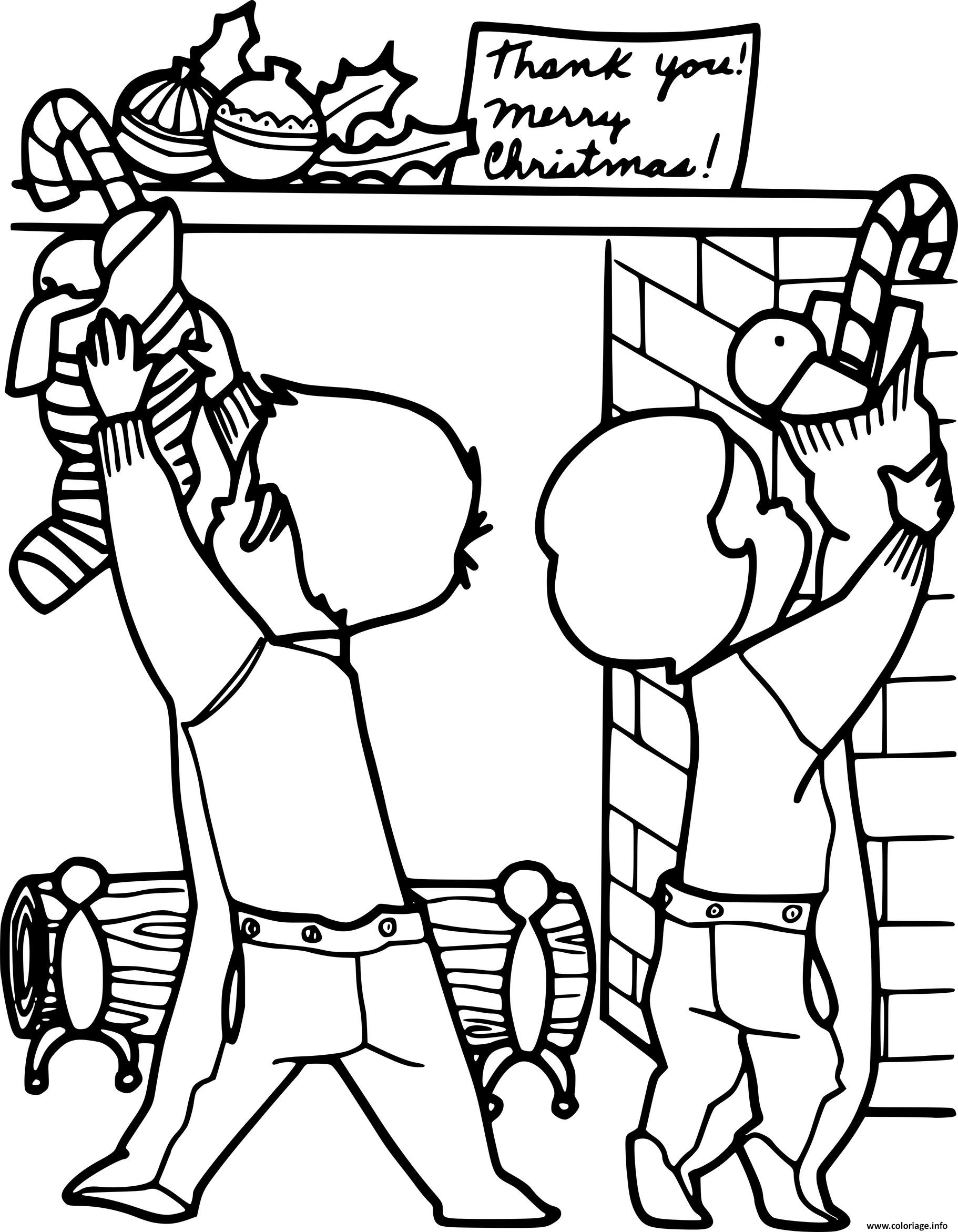 Dessin deux petits enfants accrochent des bas de noel sur la cheminee Coloriage Gratuit à Imprimer