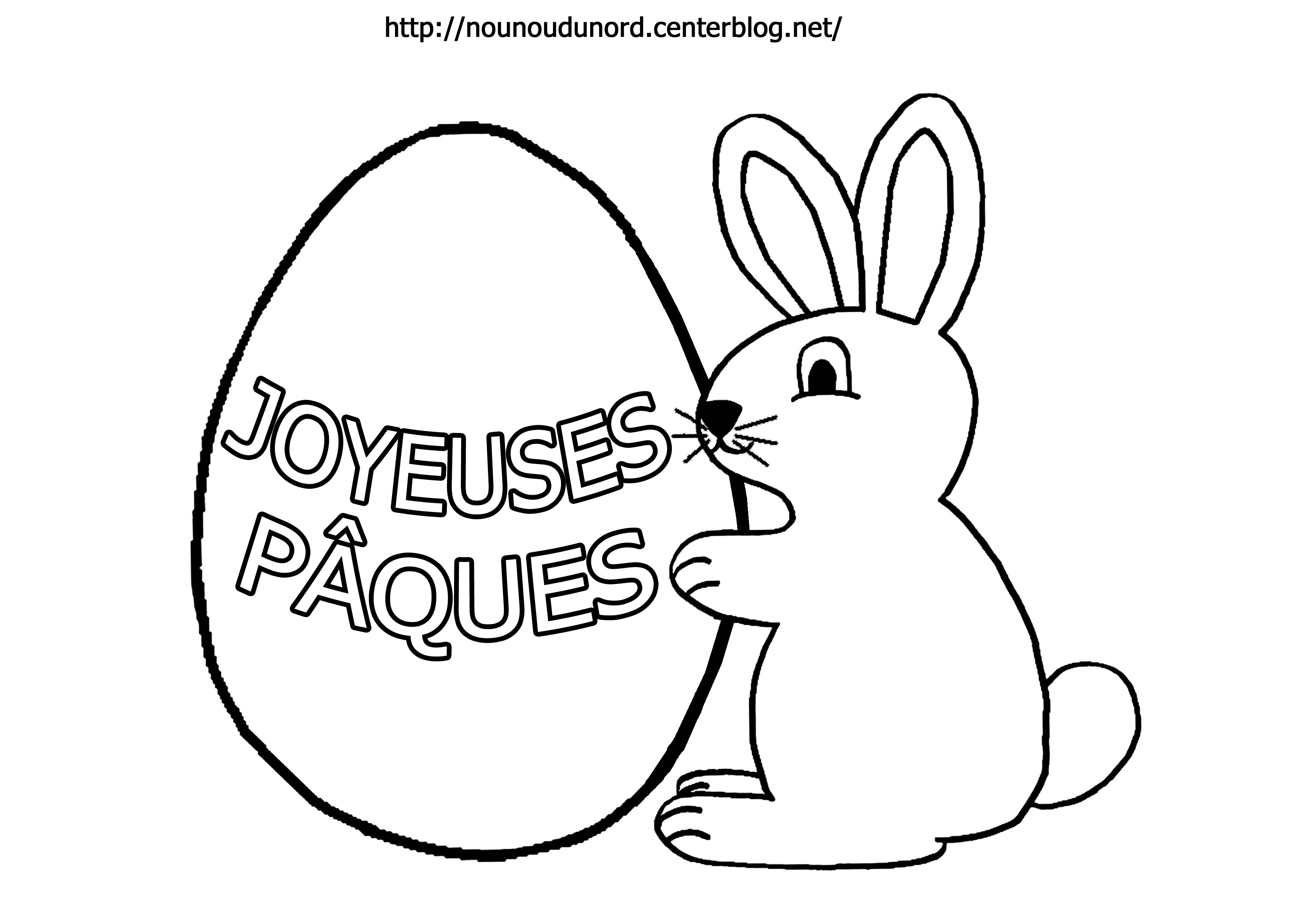 Coloriage Lapin de Pâques avec panier d'œufs colorés - Pâques à imprimer